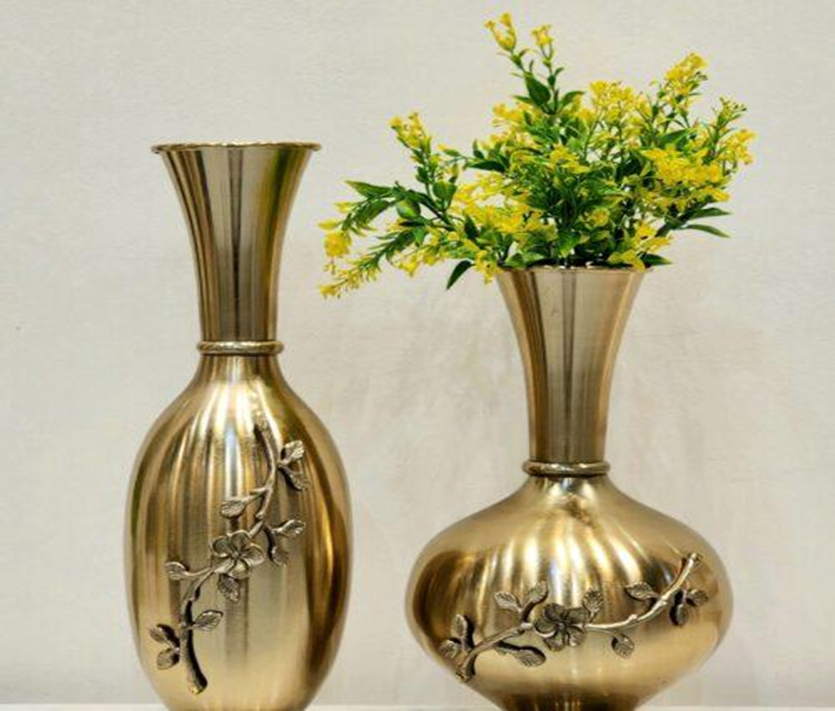statement piece, Metal flower vases on console table